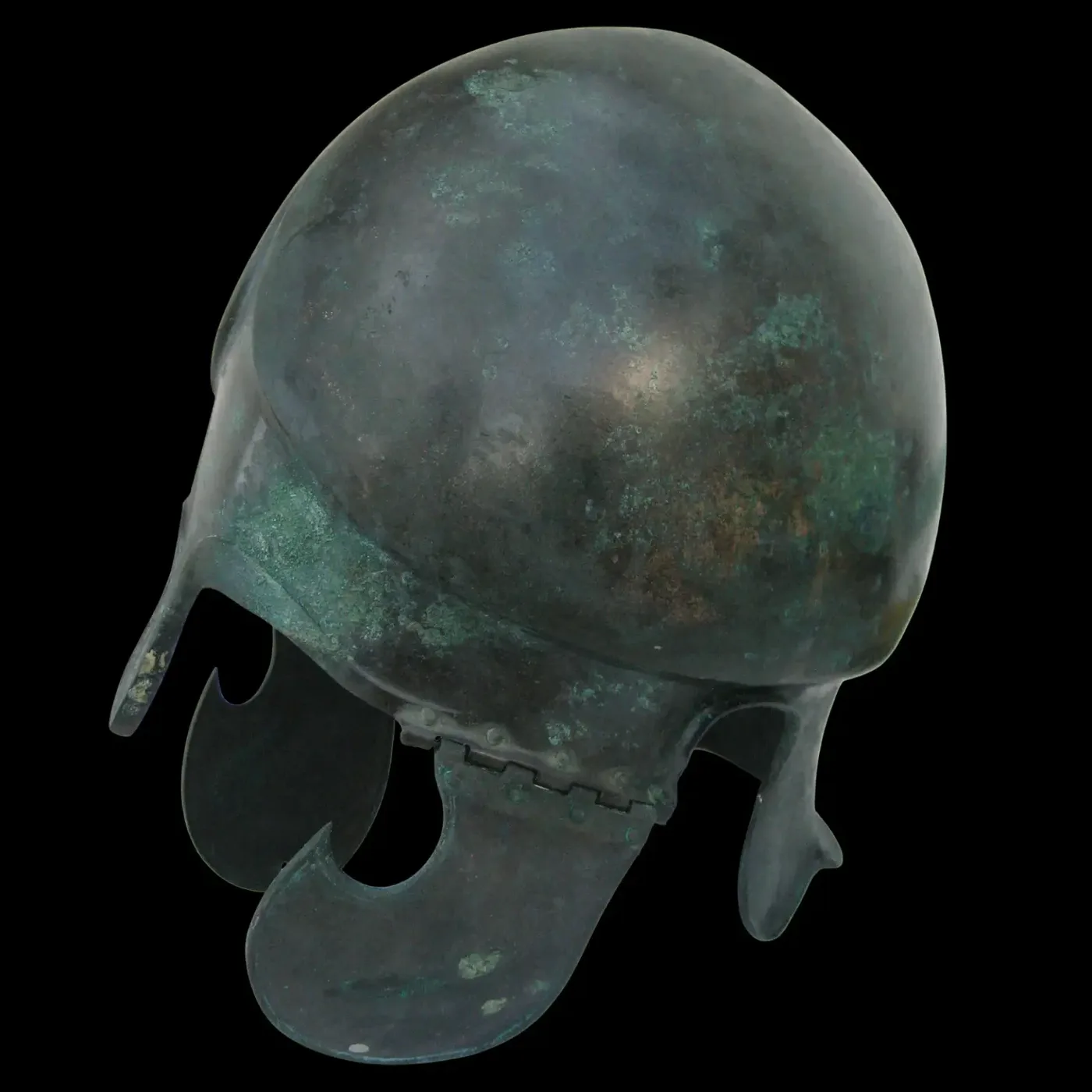 Ancient bronze helmet with preserved complex patina